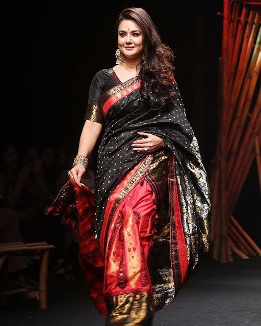 Preity Zinta wearing a black saree 